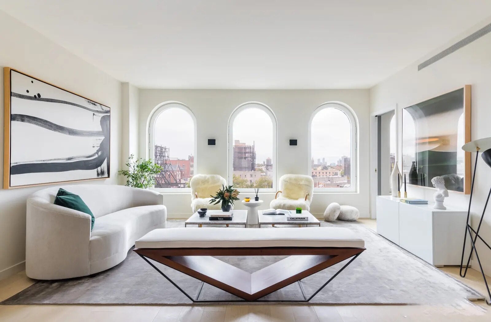 Living room with three arched windows